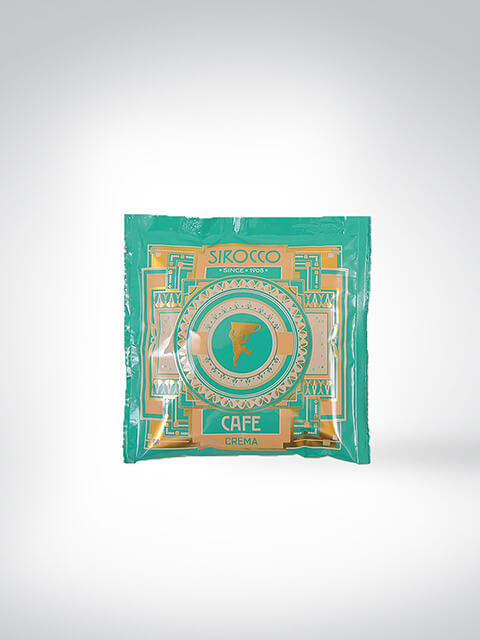 Verpackung der Sirocco Café Crema mit kunstvollem Design in Türkis und Gold