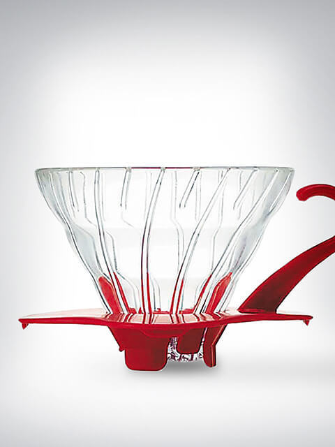 Kaffeefilter aus Glas mit rotem Kunststoffständer, ideal für manuelles Brühen