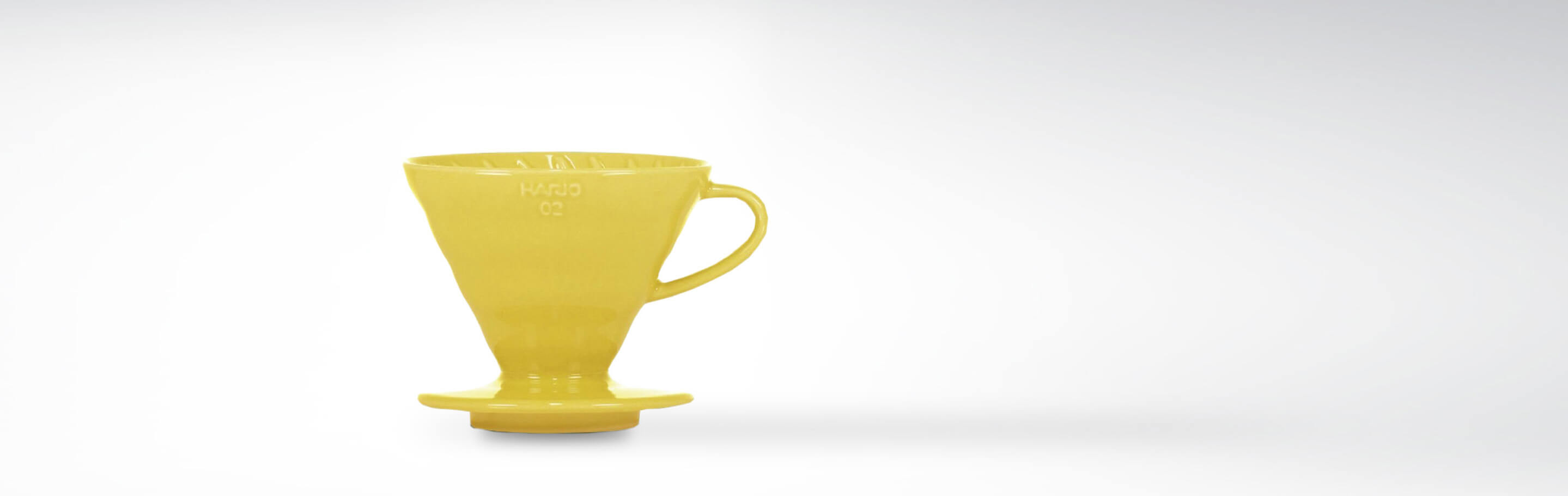 Gelber Hario V60 Kaffeefilterhalter in Größe 02 aus Keramik