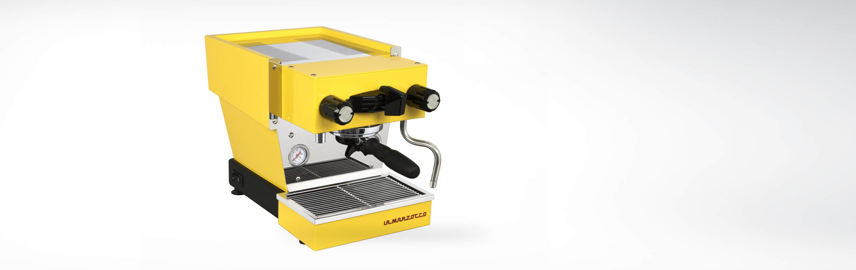 Gelbe La Marzocco Espressomaschine mit Siebträger und Dampfdüse