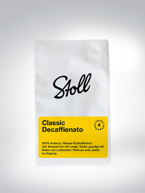 Verpackung von Stoll Classic Decaffienato Kaffee, 100% Arabica, wasserentkoffeiniert, mit Geschmacksnoten von Lebkuchen, Walnuss und Lakritz.