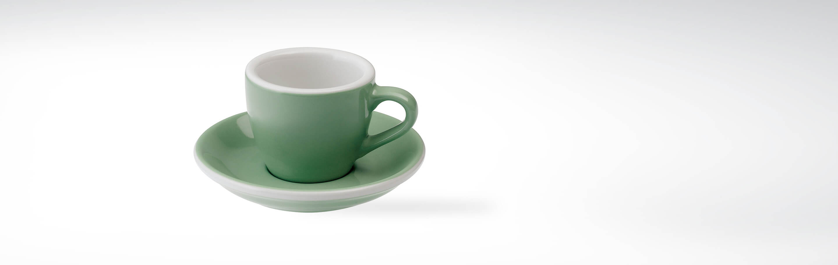 Grüne Espressotasse mit Untertasse aus Keramik