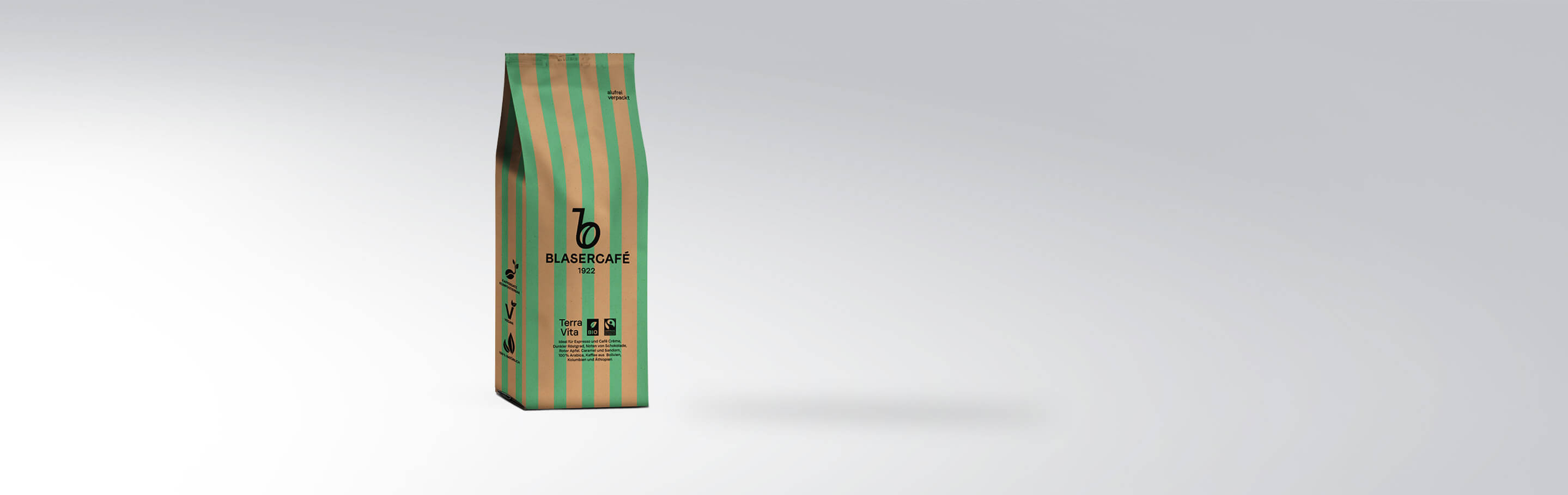 Verpackung von Blaser Café Terra Vita mit grün-beigen Streifen, Markenlogo und Fair-Trade-Siegel
