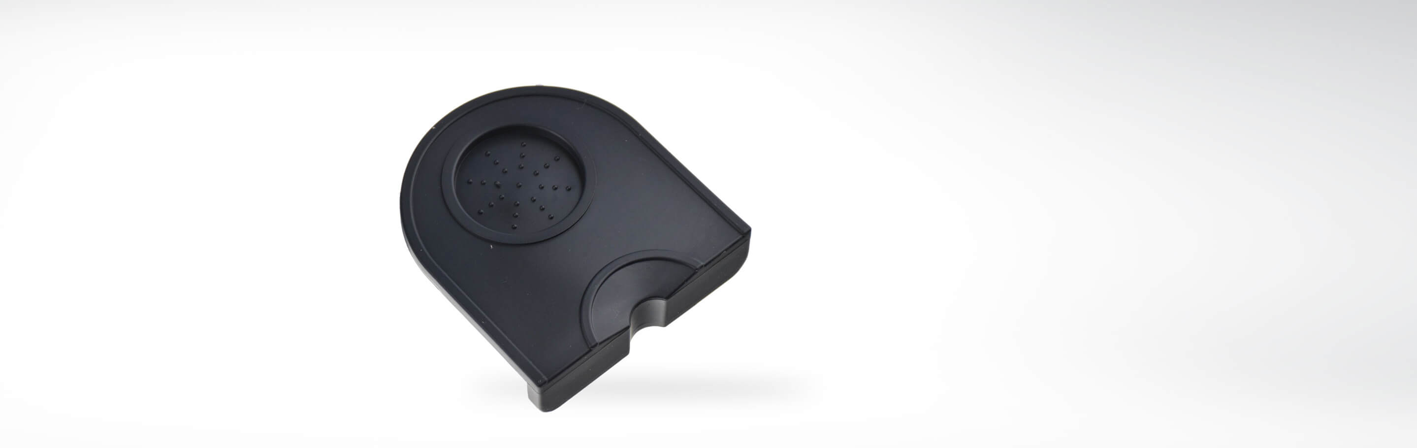 Schwarzer Kaffeefilterhalter aus Kunststoff, rechteckige Form mit rundem Abschnitt und Tropfdesign