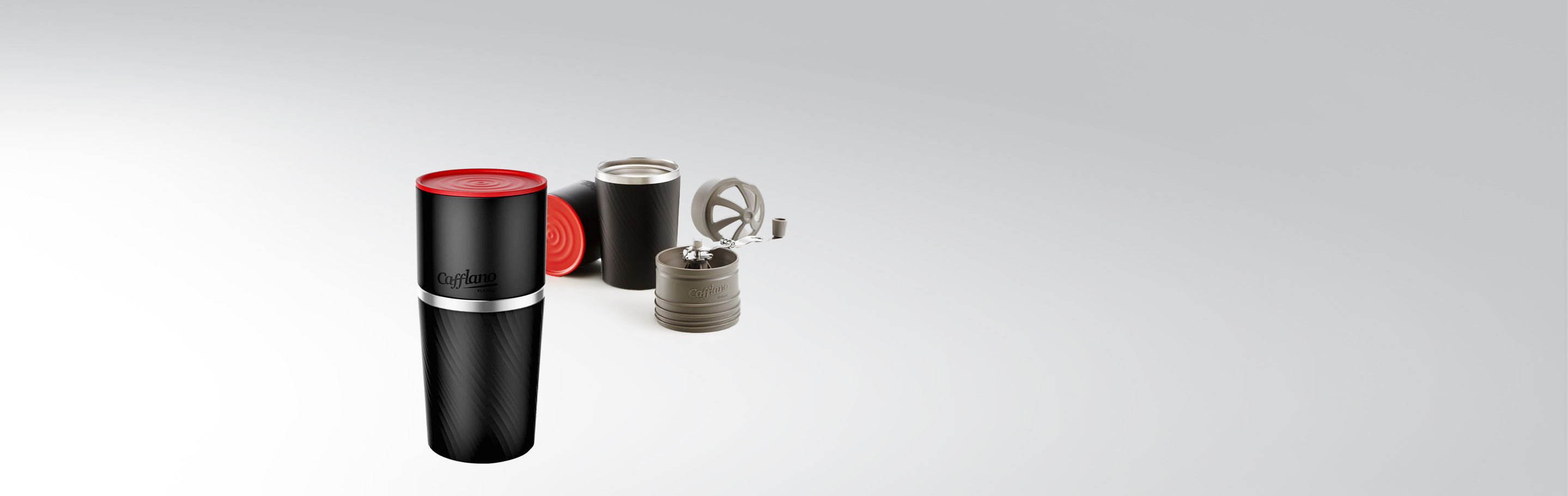 Cafflano All-in-One Kaffeebereiter-Set mit schwarzem Gehäuse und rotem Deckel, bestehend aus verschiedenen Elementen zur Kaffeezubereitung