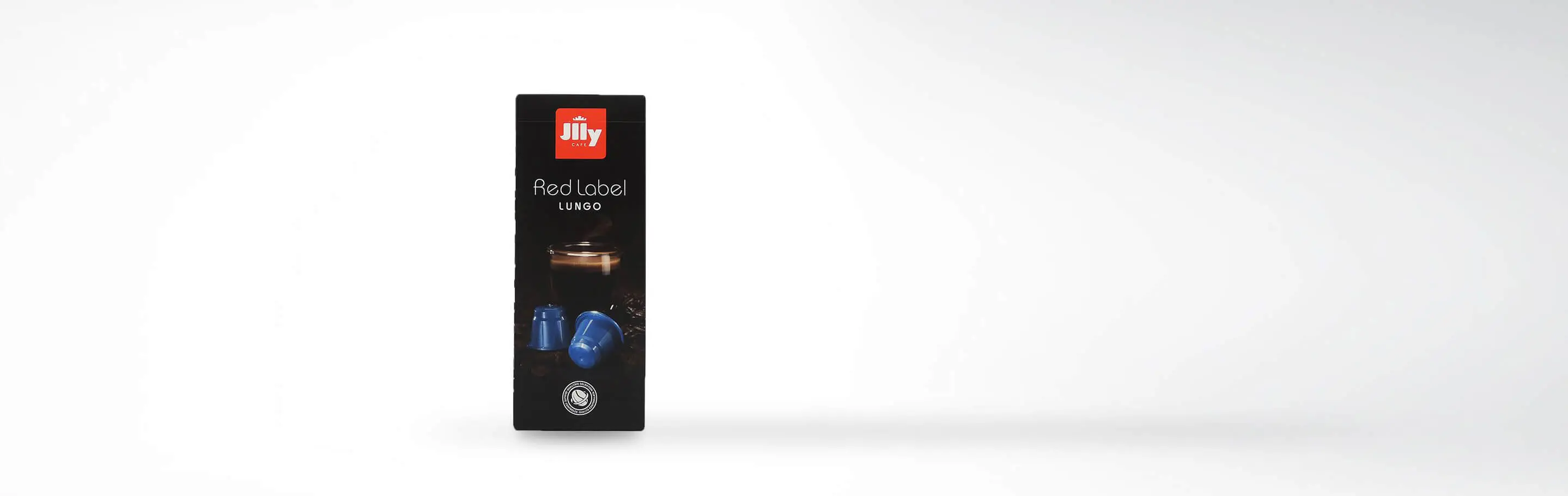 Packung mit Jilly Kaffee Red Label Lungo Kapseln auf weißem Hintergrund